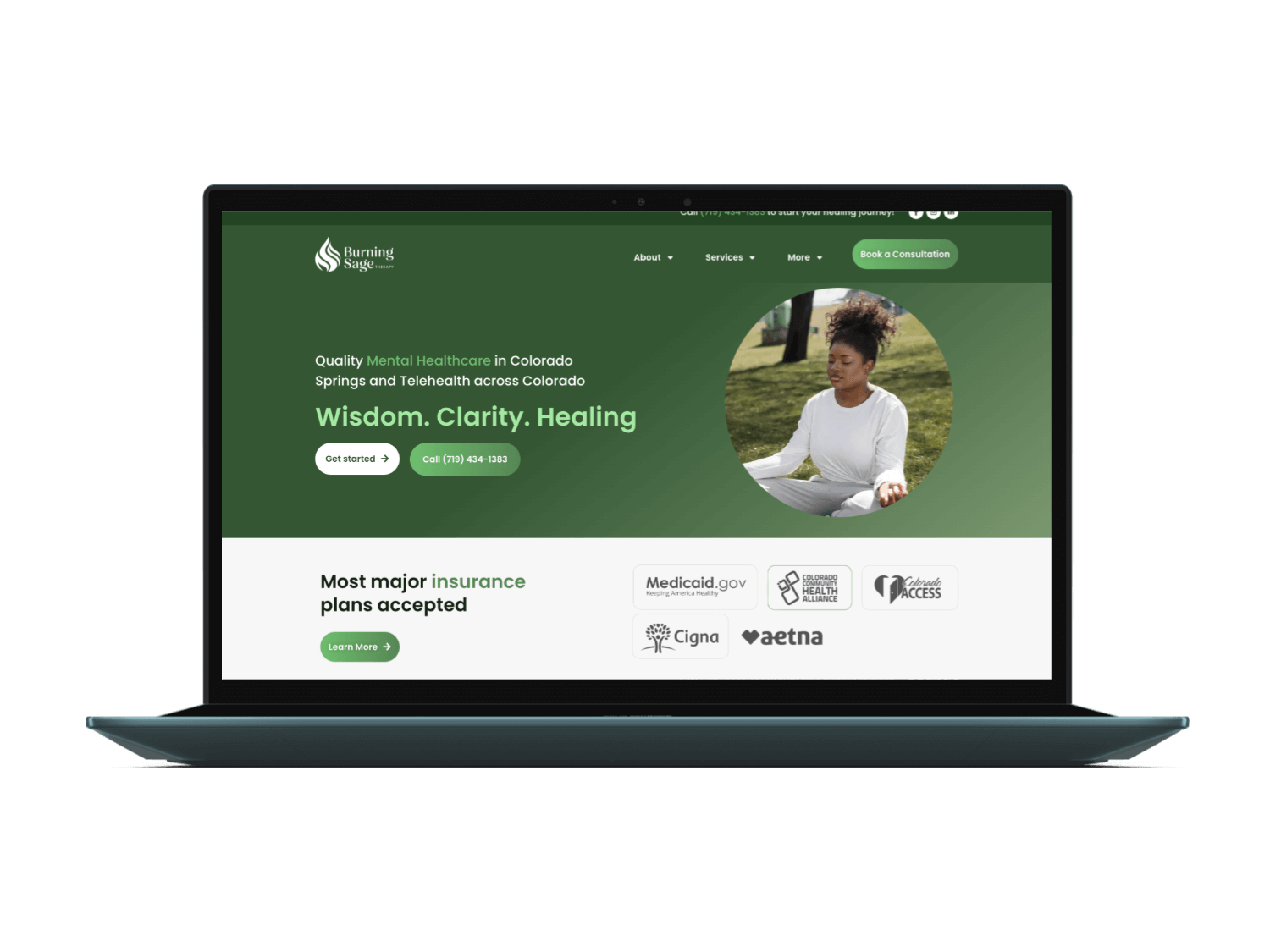 A therapist website live on a laptop screen